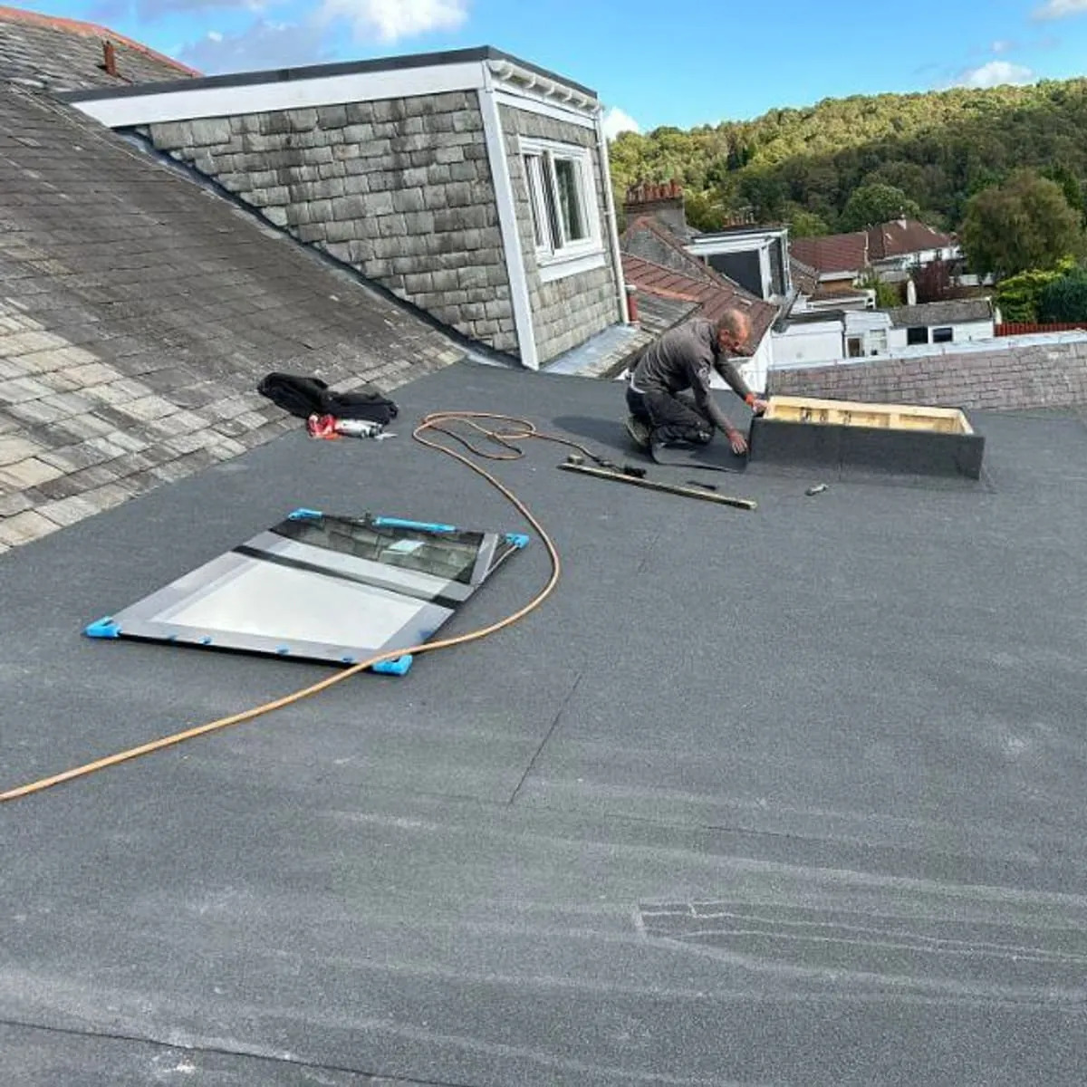 Flat felt roof and rooflights