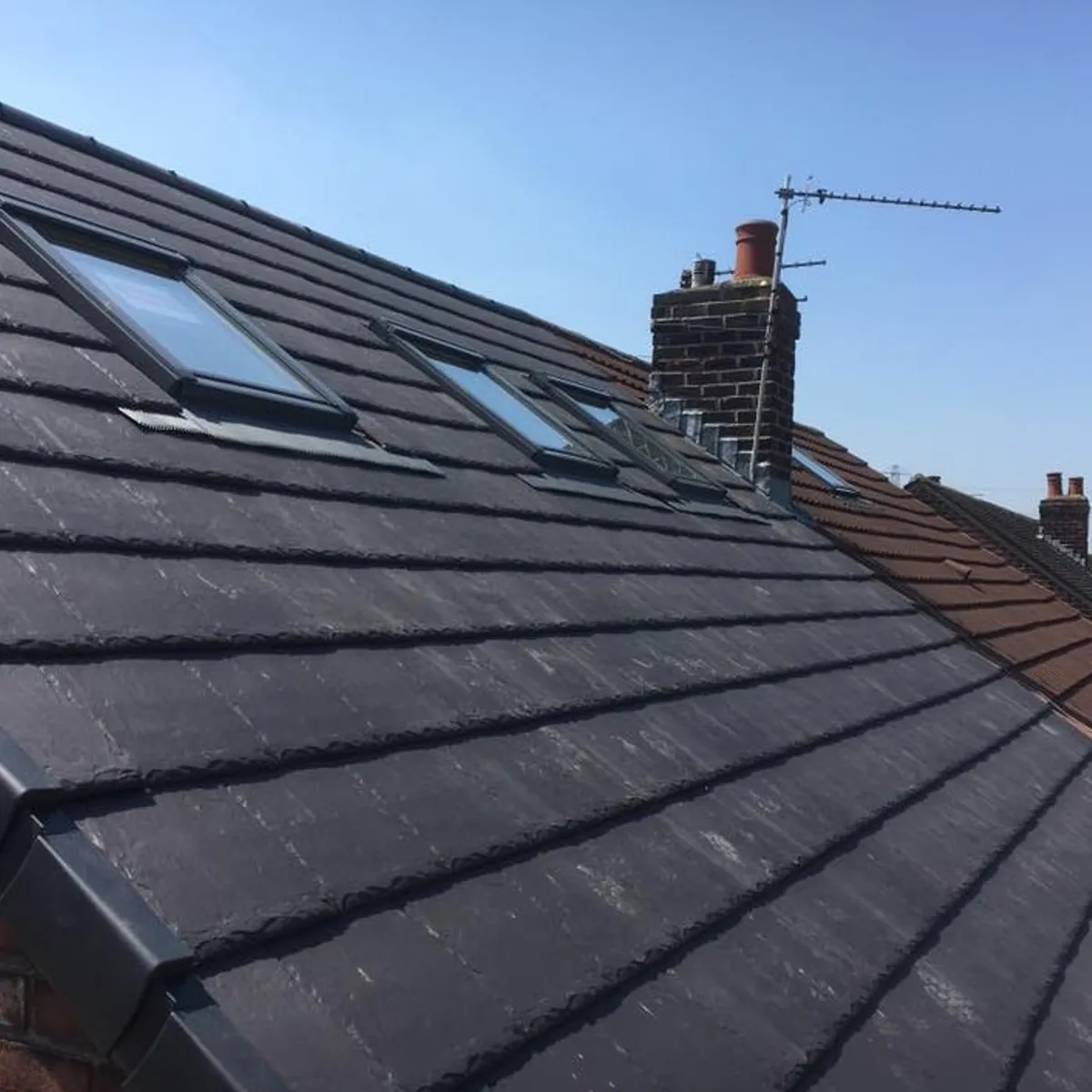 New slate roof with rooflights